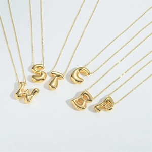 3D balloon initial letter pendants in gold finish on minimalist chain necklaces