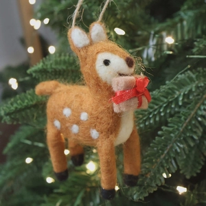 Handmade wool felt reindeer Christmas ornament with red gift box and rustic hanging rope