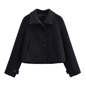 Classic black wool-like cropped jacket with lapel collar and button closure on white background