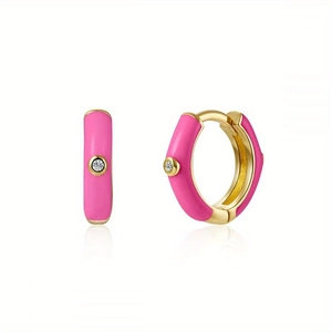 Pink enamel C-shaped gold hoop earrings with zircon stone on white background