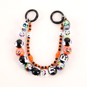 Halloween beaded phone strap with pumpkin, ghost charms and HALLOWEEN letter beads