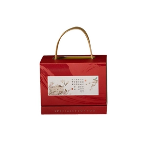 Red Chinese wedding favor gift box with golden handles and vintage floral illustration