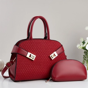 Elegant red tote bag and matching clutch set with woven texture and gold hardware