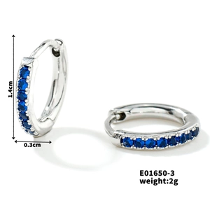 Detail view of silver hoop earrings with blue round gemstones showing 1.4cm dimensions