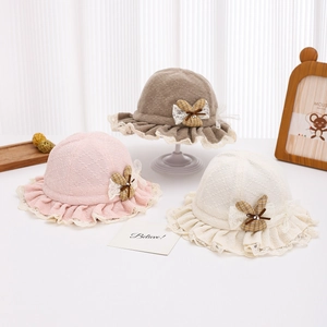 Knitted baby sun hats with lace trim and checkered bows in pink, beige and brown