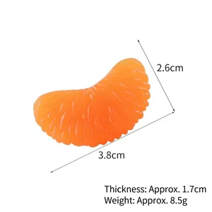 Lifelike PVC orange segment keychain charm measuring 3.8x2.6cm and weighing 8.5g