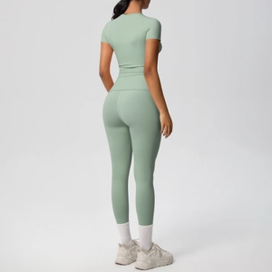 Detail view of the back profile for light green seamless yoga set with slim fit leggings