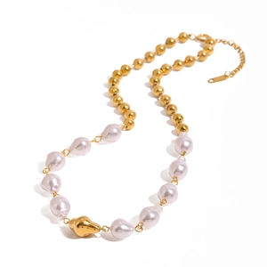 Baroque pearl and gold bead spliced stainless steel necklace on white background