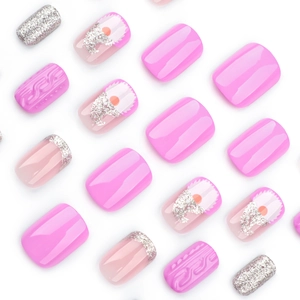 Short square press-on nails with 3D sweater texture, silver glitter, and gnome designs