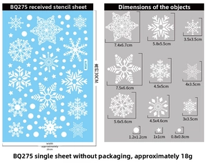 Detailed view of white snowflake window stickers showing varied sizes and dimensions