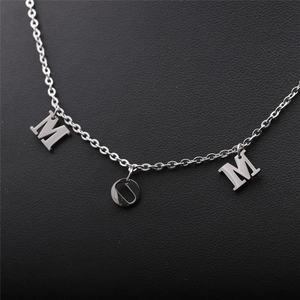 Silver stainless steel MOM letter necklace pendant for Mother's Day on black background