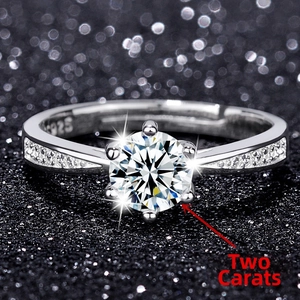 Macro shot of 2 carat round zircon ring showing S925 hallmark and six-prong crown setting