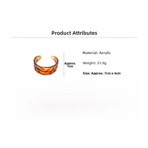 Detail view showing acrylic resin bangle dimensions 7cm by 6cm with tortoise pattern