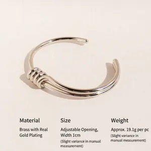 Minimalist silver knotted open cuff bracelet in double-layered spiral brass design