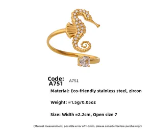 Macro detail of seahorse shaped ring with sparkling 5A zircon and 18k gold plating