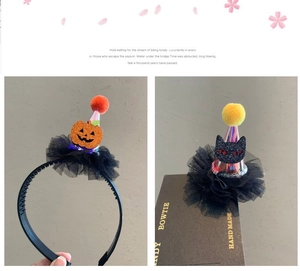 Halloween headband featuring a pumpkin, black cat, and mini party hat with sequins