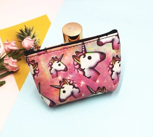 Detail of cute unicorn coin purse with zipper closure and colorful star pattern