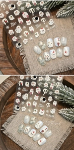 Détails de stickers nail art 3D avec bonhommes de neige et motifs de flocons