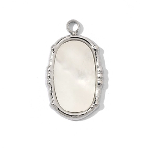 Close-up of a silver stainless steel oval pendant with a white mother-of-pearl inlay