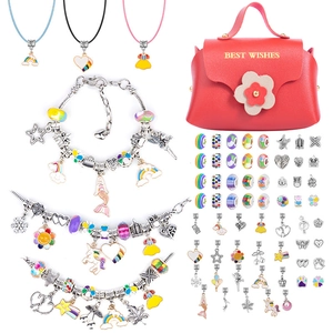 DIY charm bracelet kit for kids with pink handbag, assorted colorful beads and pendants
