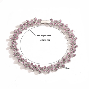 Silver flower bracelet with pink stones, 18cm chain length and 7.5mm flower charms