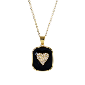 Elegant gold chain heart necklace featuring a black enamel pendant with sparkling crystals