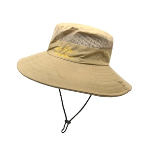 Close-up of breathable mesh fabric and Traveller embroidery on khaki outdoor sun hat
