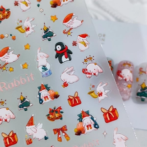 5D Christmas nail stickers with rabbit, penguin, and tree designs for holiday nail art