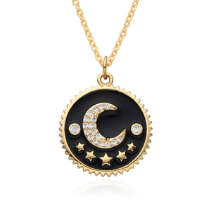 Golden star and moon medal necklace with black enamel and sparkling white zircons