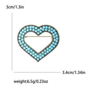 Geometric heart brooch in bronze metal with turquoise beads and size dimensions