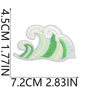 Macro detail of wave embroidery patch with dimensions 7.2cm by 4.5cm on white background