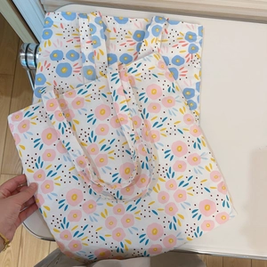 Floral print canvas tote bags in pink and blue flowers with large capacity for students