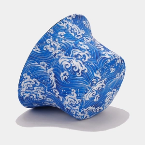Detailed side view of fisherman hat with Japanese blue ocean wave print and fine stitching