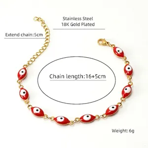 Detail of 18K gold-plated stainless steel evil eye bracelet with lobster clasp and chain