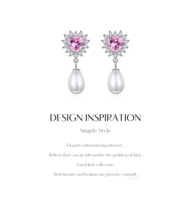 Detailed view of S925 sterling silver heart earrings with pink gems and pearls
