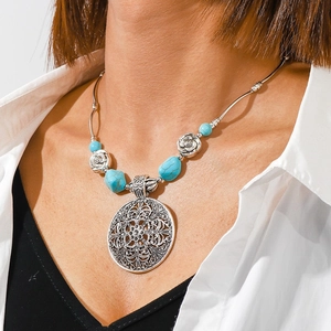 Bohemian silver necklace with turquoise beads and large vintage filigree pendant
