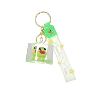 Cute green frog oil liquid keychain with acrylic cube and Happy Moments silicone strap