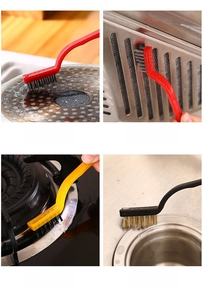 Detail of kitchen scrub brushes cleaning stovetops, range hoods, crevices, and sinks