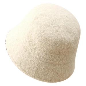 Minimalist beige plush bucket hat for women with warm textured knit for autumn and winter