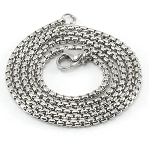 Polished silver stainless steel box chain necklace with lobster clasp on white background