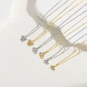 Elegant gold and silver butterfly and heart pendant necklaces with zircon inlay