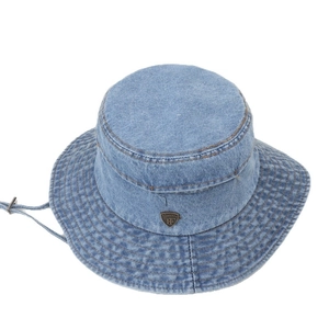 Women's light blue washed denim bucket hat with wide brim and adjustable drawstring