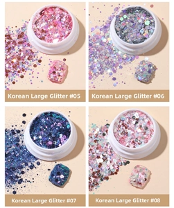 Detailed macro view of mixed chunky glitter nail art sequins in four colors 05 to 08