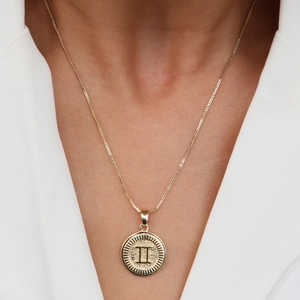18k gold plated brass necklace featuring a round Gemini constellation coin pendant