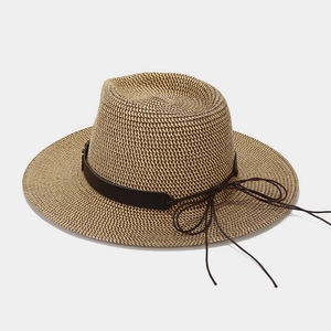 British style tan woven panama hat with wide brim and leather bow strap detail