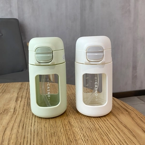 Detailed view of 150ml portable glass coffee cups with straw and measurement scales