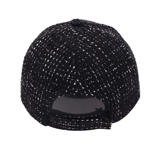 Classic black and white tweed baseball cap with adjustable strap seen from behind