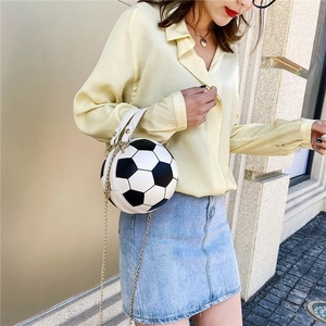 Fashionable soccer ball shaped crossbody bag with black and white pattern and gold chain