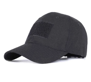 Close-up of black tactical baseball cap featuring a front hook-and-loop patch area