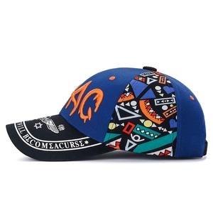 Blue baseball cap with letter embroidery and geometric print from a 45-degree angle